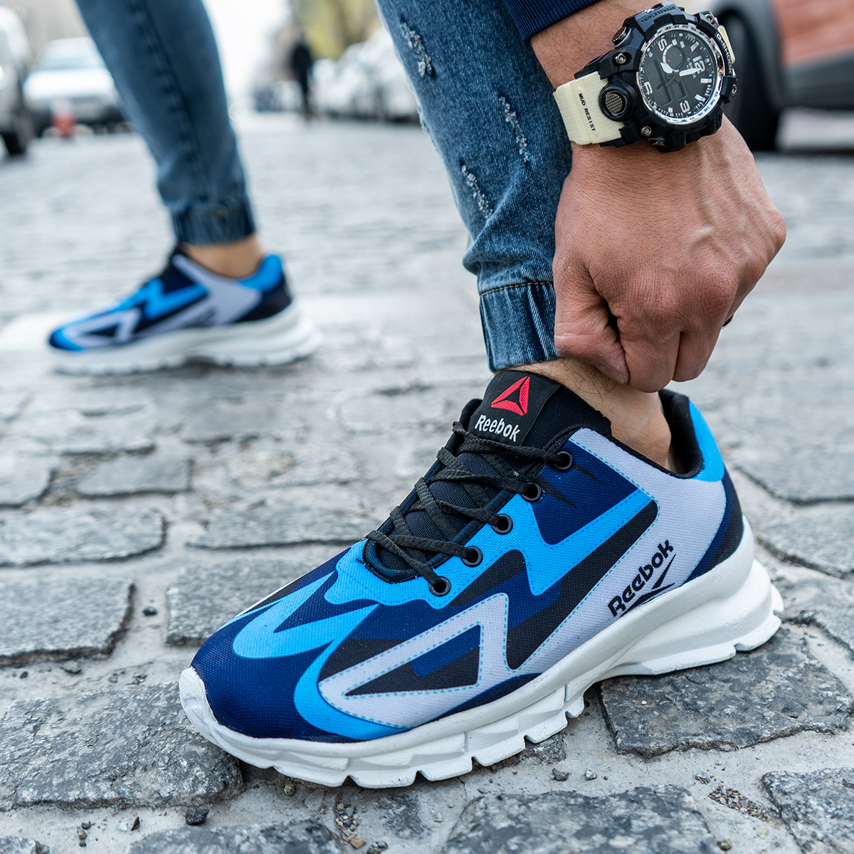 کفش ورزشی ریبوک آبی طوسی مردانه مدل Ervan