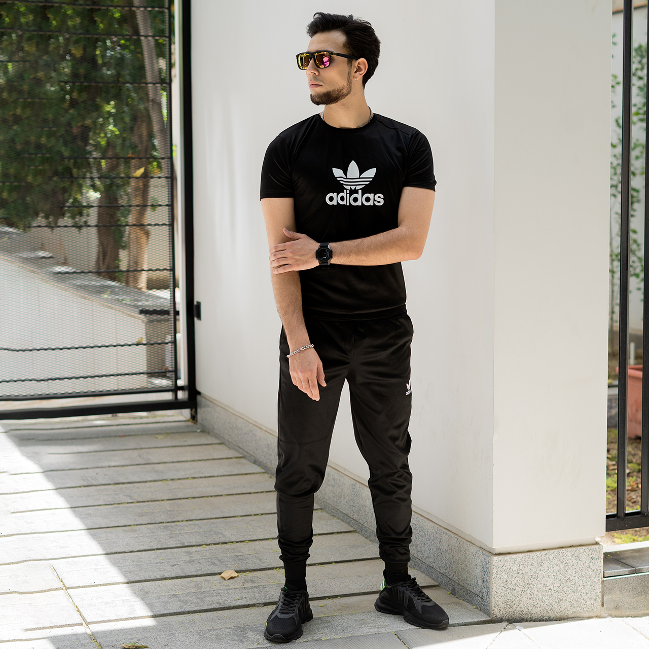 ست تیشرت شلوار آدیداس مشکی مردانه مدل Otava