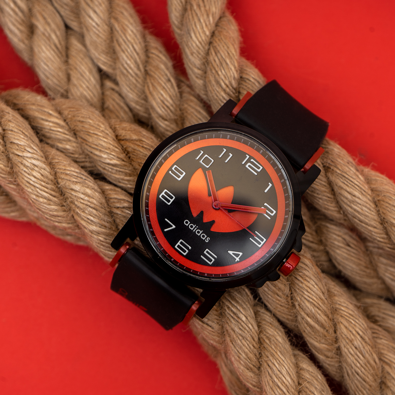 ساعت مچی آدیداس مشکی قرمزمدل E51