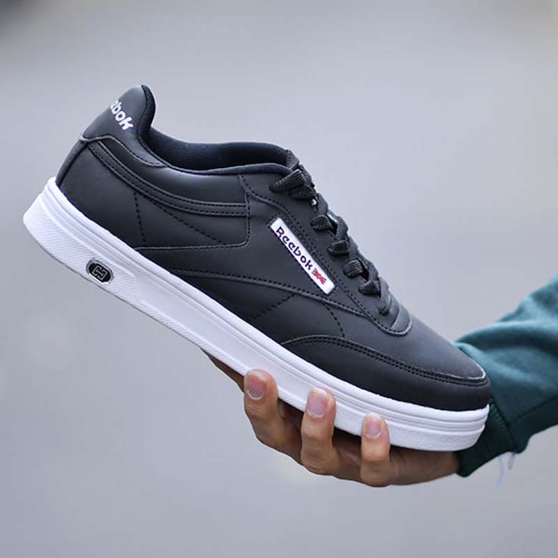 کفش ورزشی Reebok مردانه مشکی زیره سفیدمدل Flag