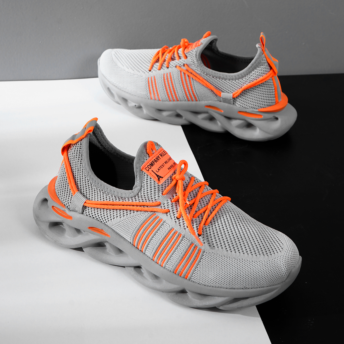 کفش ورزشی طوسی نارنجی مردانه مدل Arisan