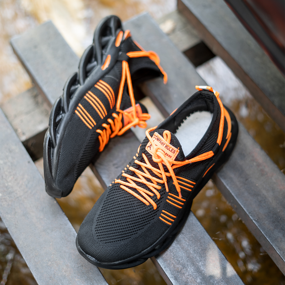 کفش ورزشی مشکی نارنجی مردانه مدل Arisan