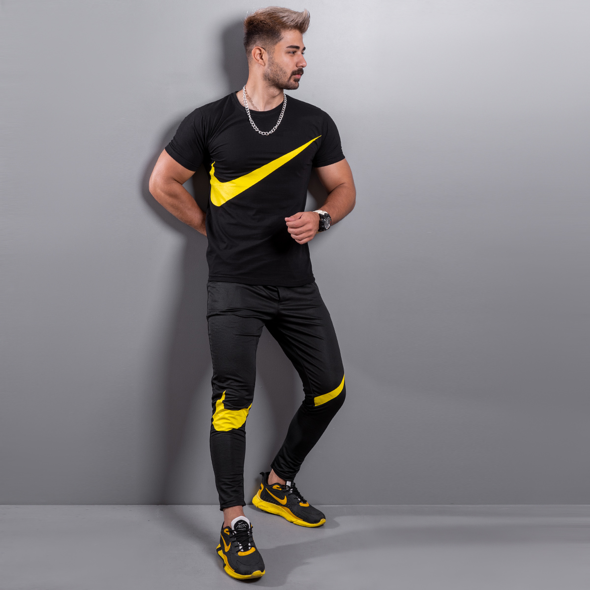 ست تیشرت شلوار نایک مشکی زرد مردانه مدل Baren